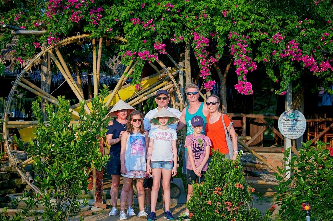 Happy family on a Hoi An & Da Nang private tour with Man