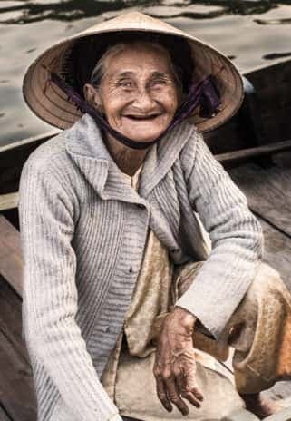 Elder Vietnamese lady. Private Hoi An, Da Nang & Hue tours with Man